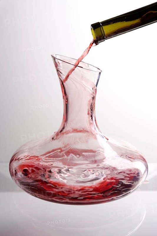 Red wine being decanted