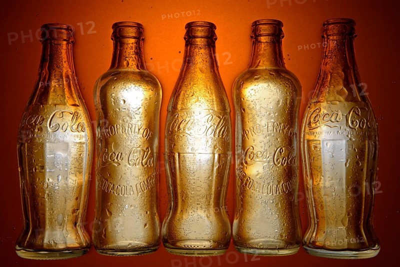 Various historic Coca-Cola bottles