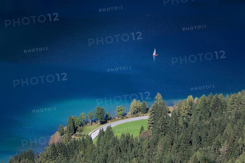 View over the deep blue and clear waters of Weissensee lake