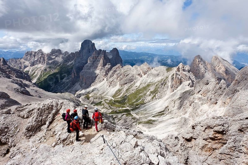 Climbers climbing Kesselkogel mountain via the fixed rope route above the Grasleitenpass