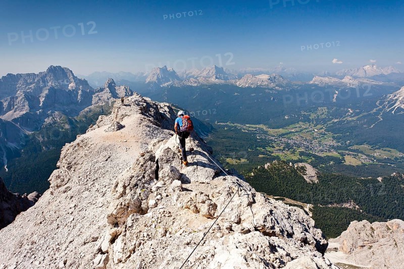 Climber walking on the Marino Bianchi fixed rope route