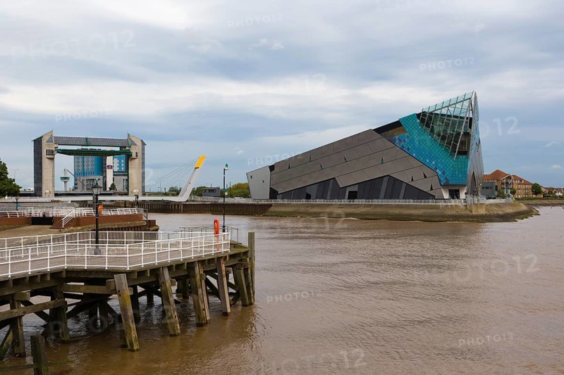 The Deep and The River Hull tidal barrier viewed from the west bank of the river Hull
