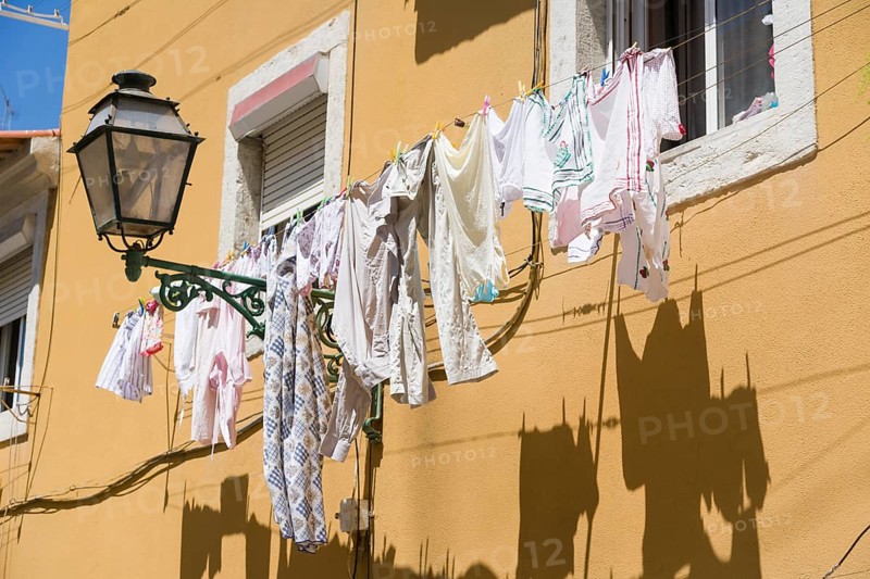Washing line in front of house