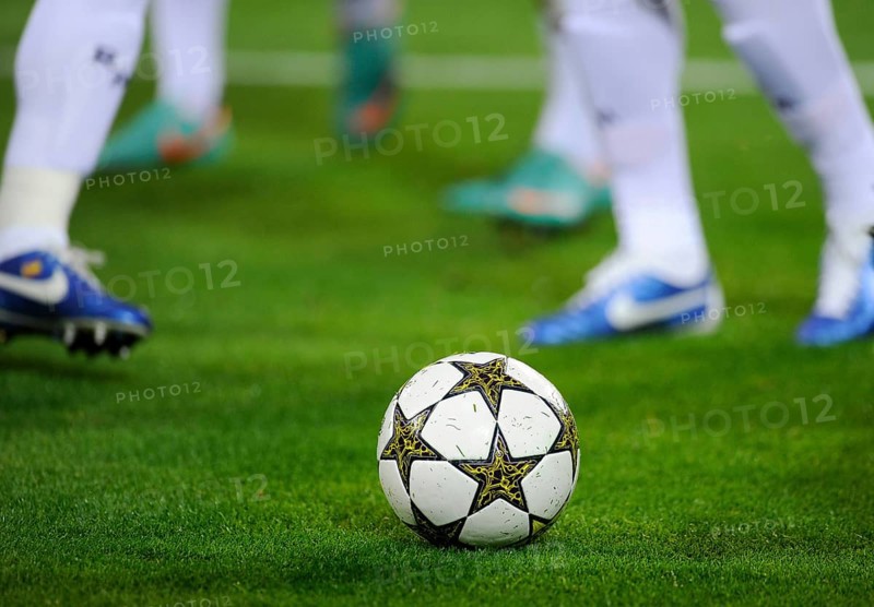 Real Madrid players running after the official match ball