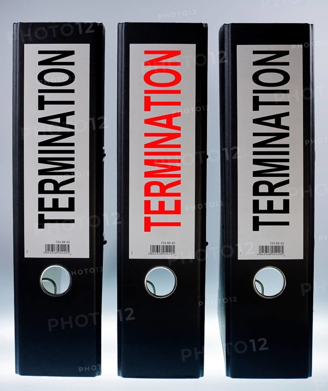 Three ring binders labelled 'TERMINATION'