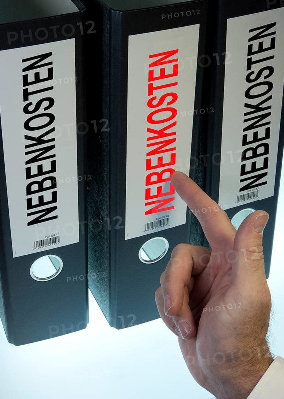 Hand pointing to a file folder labeled 'Nebenkosten'