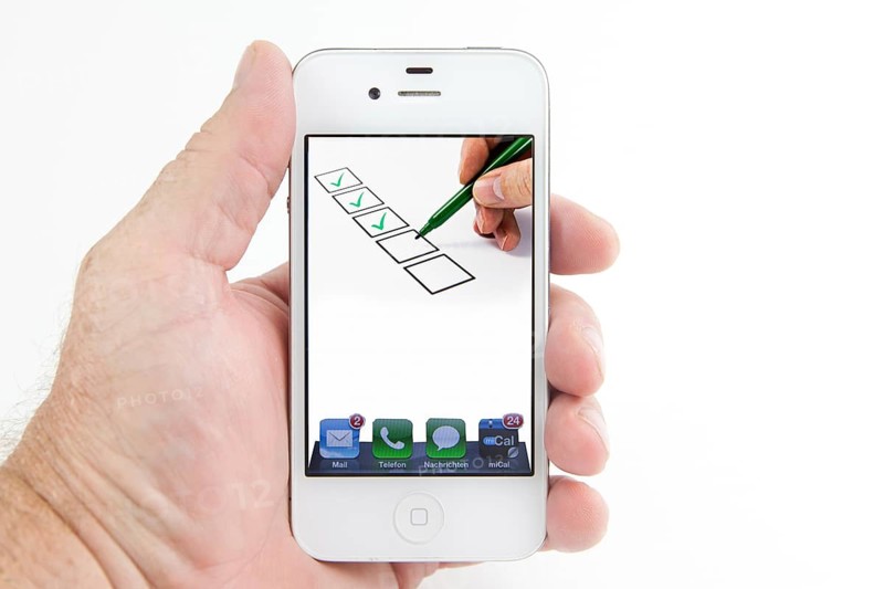 Boxes are ticked off on the display of a smartphone