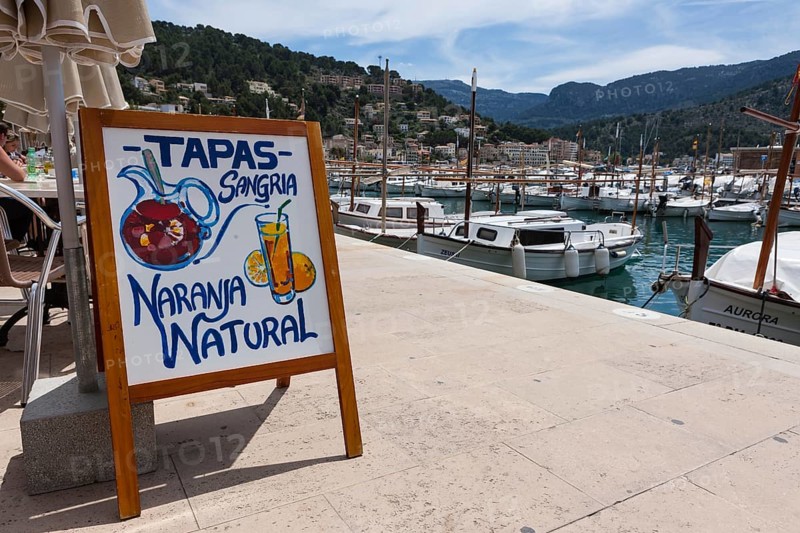 Menu board for tapas at a restaurant in Port de Sóller