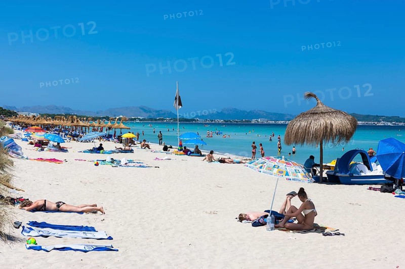 Sandy beach with tourists