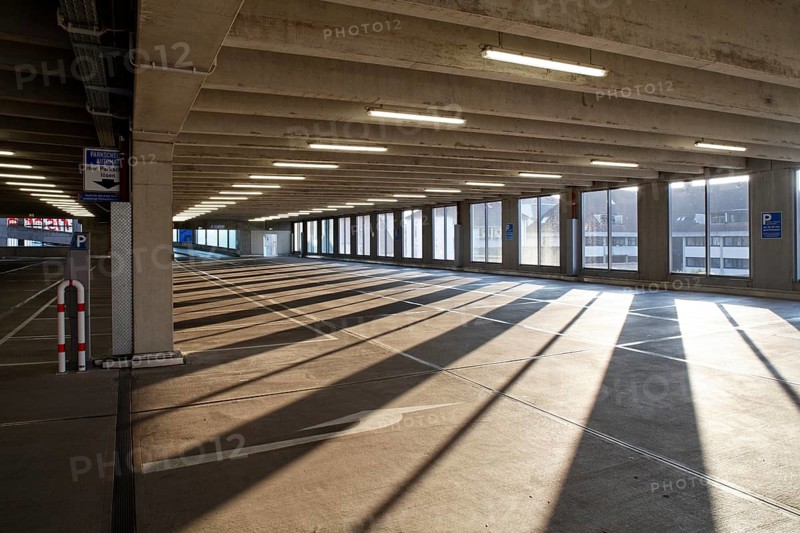 Empty parking garage of the Hieber company in the early morning