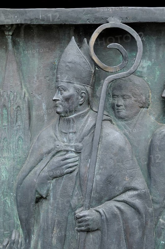 Relief of a bishop on the equestrian monument in Heumarkt square