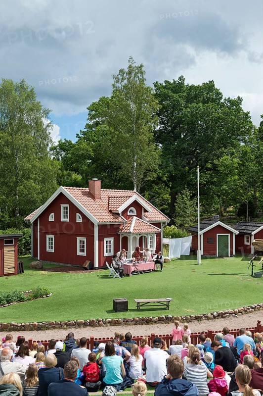 Viewers watching a scene from the children's book 'Emil of Lonneberga' by children's author Astrid Lindgren