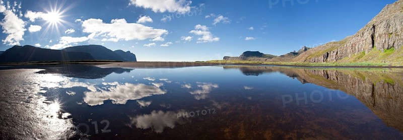Clouds with their reflection in the water