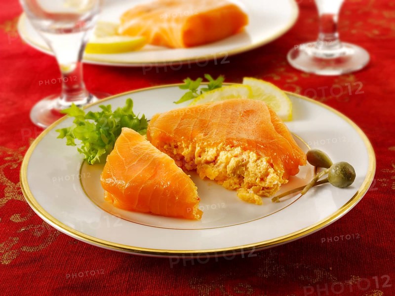Smoked salmon parcel filled with cream cheese and cream cheese and crab