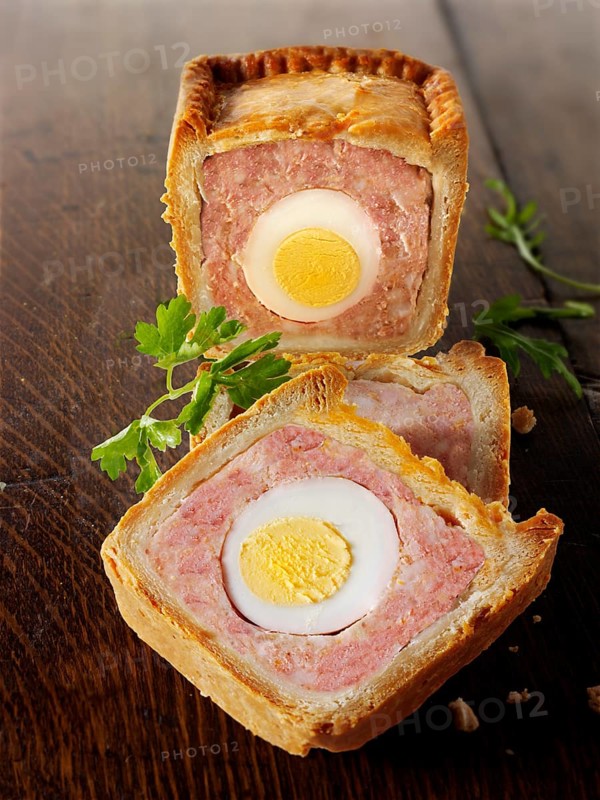 Traditional pork pie with an egg in the middle