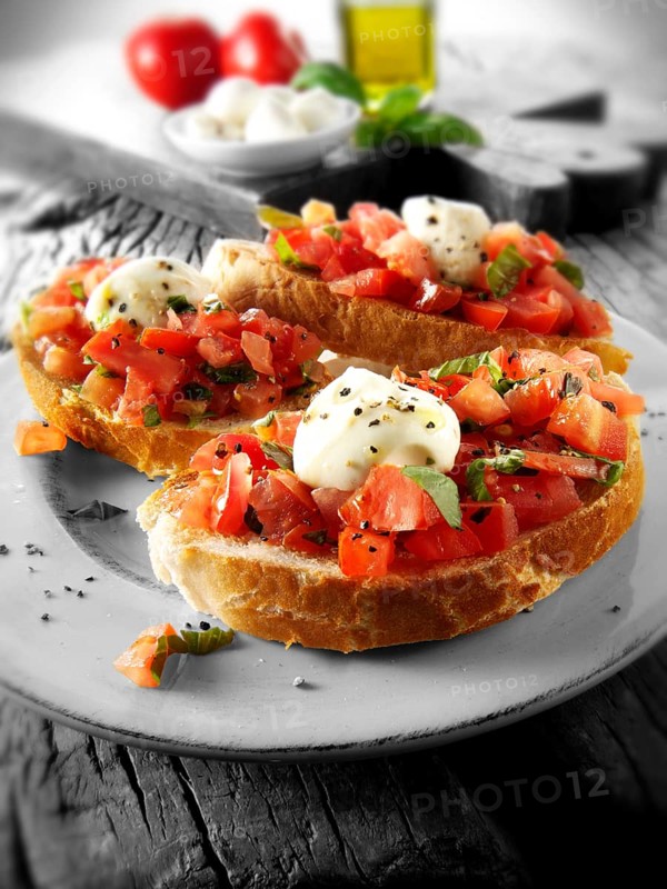 Fresh chopped beefsteak tomato with mini mozerellas bruschettas
