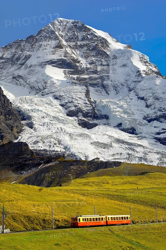 Junfraujoch funicular railway in front of the Moench from Kleine Scheidegg