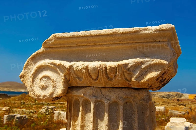 Delphic column capital of the ruins of the Greek city of Delos