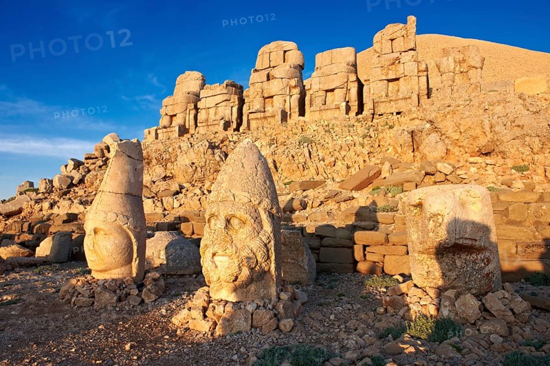 Broken statues around the tomb of Commagene King Antochius I on top of Mount Nemrut