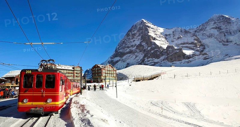 Jungfraujoch train at Kleiner Scheidegg in winter with the mountains Eiger