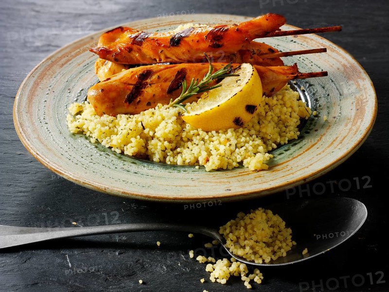 Couscous with Mediterranean roast vegetables and chicken kebabs