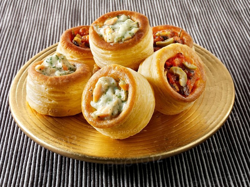 Vol-au-vents filled with salmon and dill cream and olive tapenade