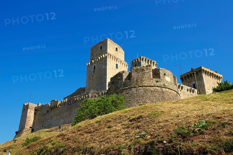 The medieval battlements of the Rocca Maggiore castle on the hilltop above Assisi