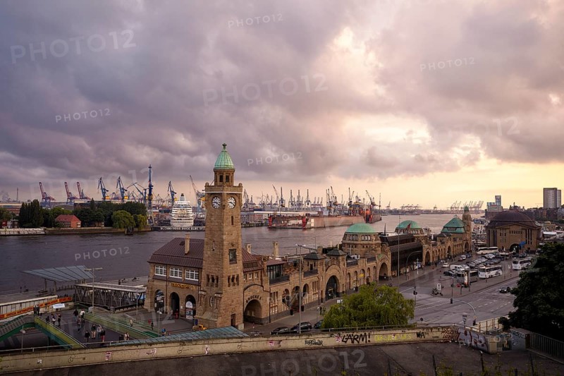 St. Pauli Landungsbrucken jetties with level tower and Blohm + Voss shipyard in Hamburg