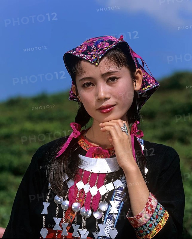 Young Miao woman wearing a traditional ethnic costume
