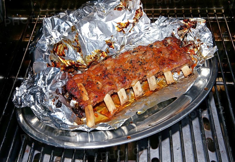 Marinated veal spareribs ready for barbecuing
