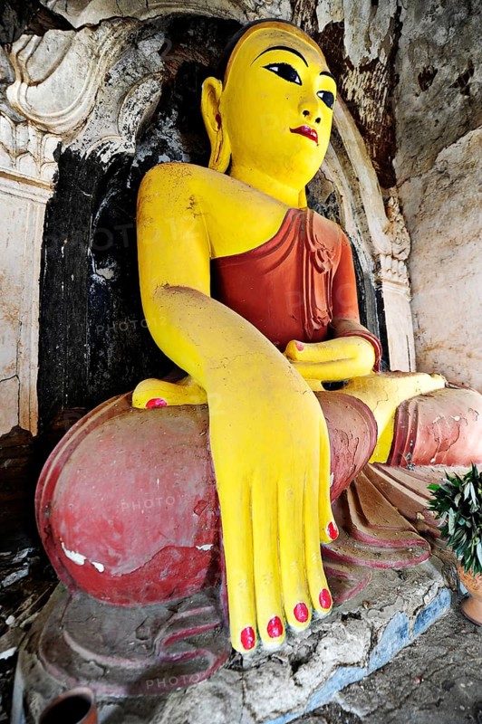 Old Buddha in a temple in Amarapura