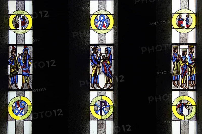 Stained glass window with Christian motifs