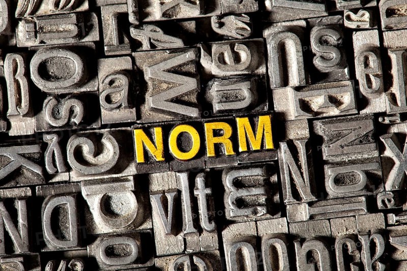 Old lead letters forming the word NORM