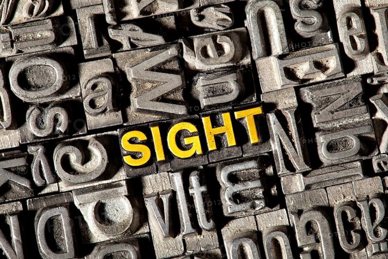 Old lead letters forming the word 'SIGHT'