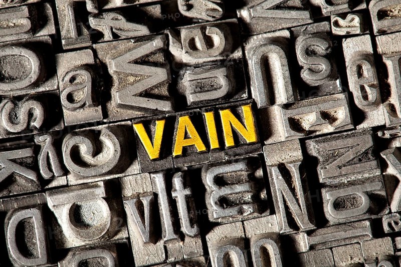 Old lead letters forming the word Vain