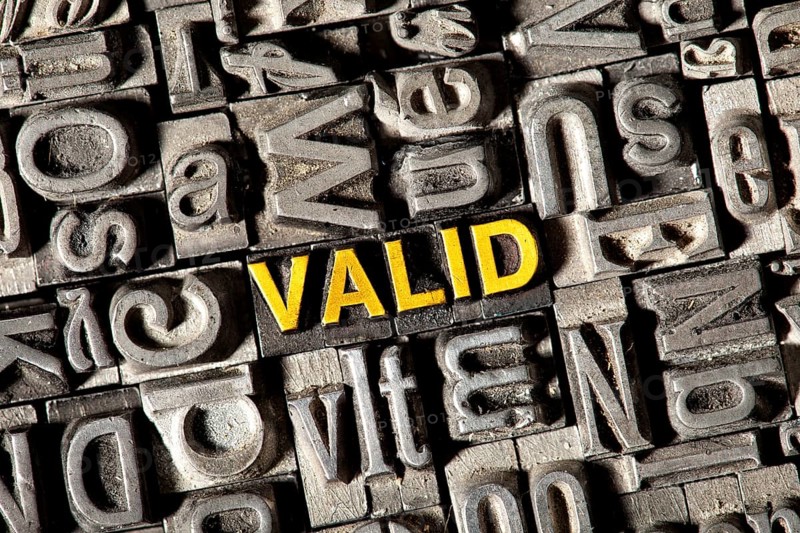 Old lead letters forming the word Valid