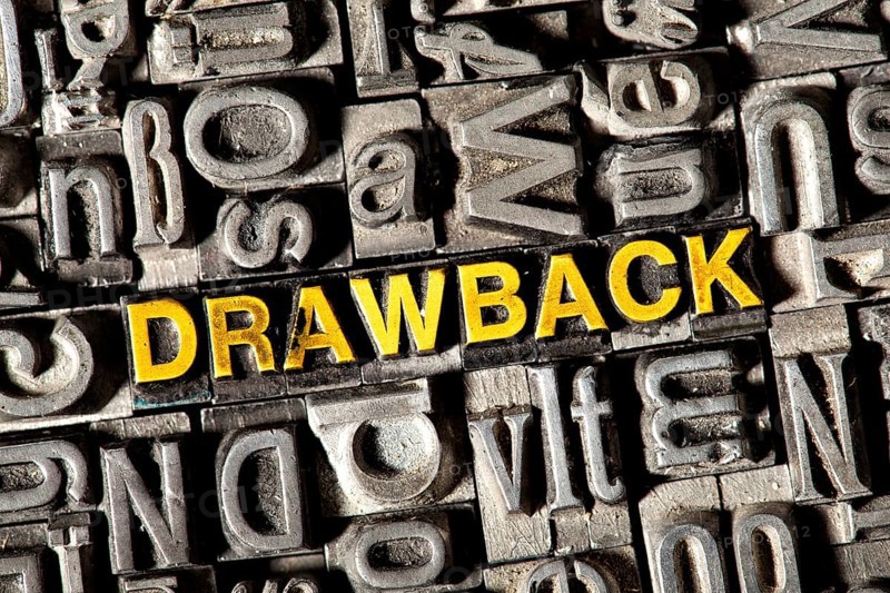 Old lead letters forming the word Drawback