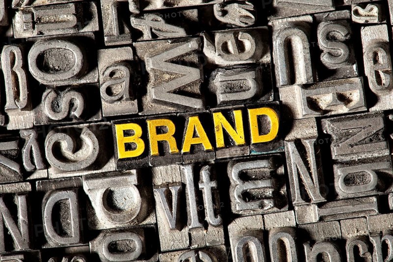 Old lead letters forming the word Brand