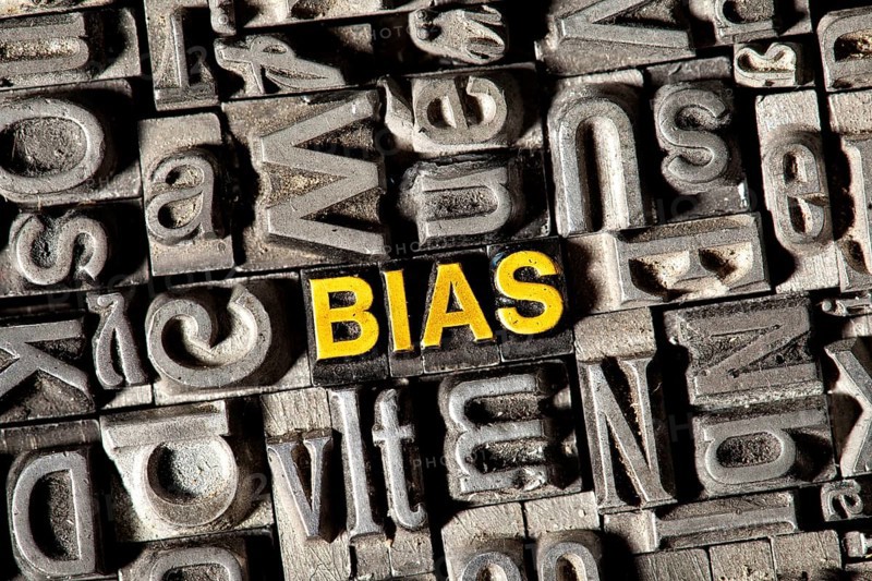 Old lead letters forming the word 'BIAS'