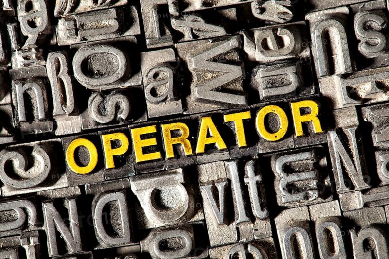 Old lead letters forming the word "OPERATOR"