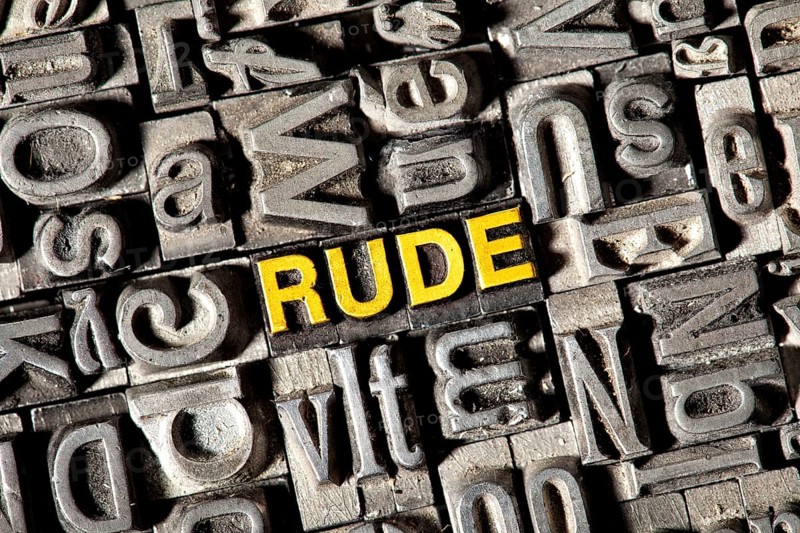 Old lead letters forming the word Rude