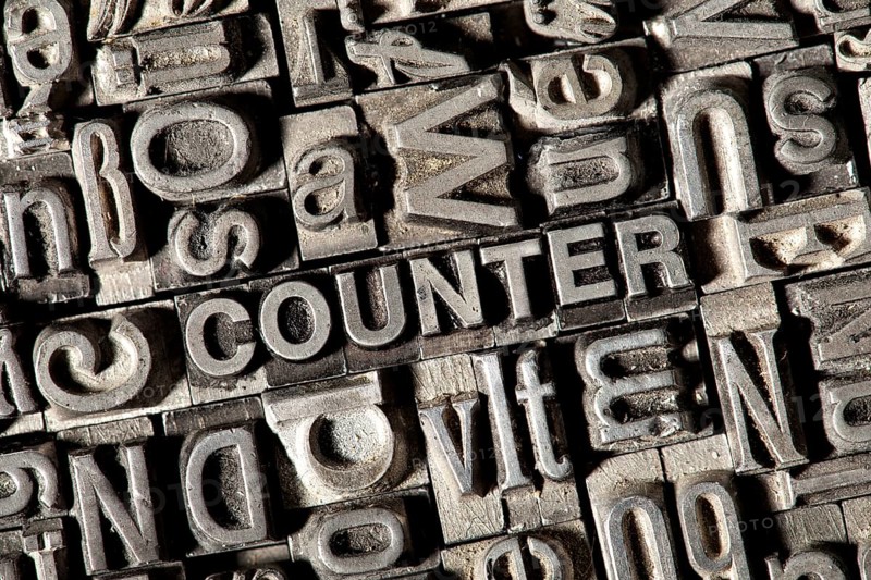 Old lead letters forming the word COUNTER