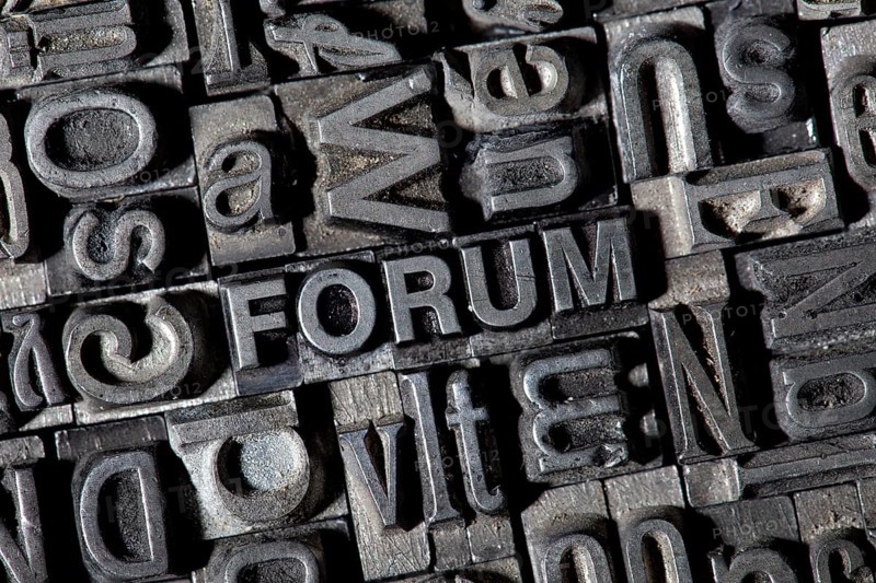 Old lead letters forming the word FORUM