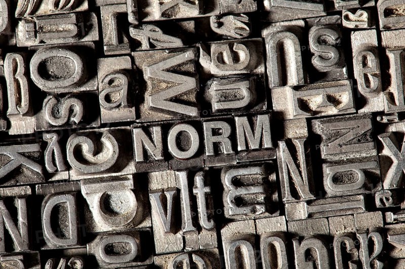 Old lead letters forming the word NORM