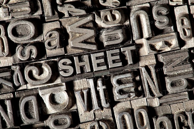 Old lead letters forming the word SHEET
