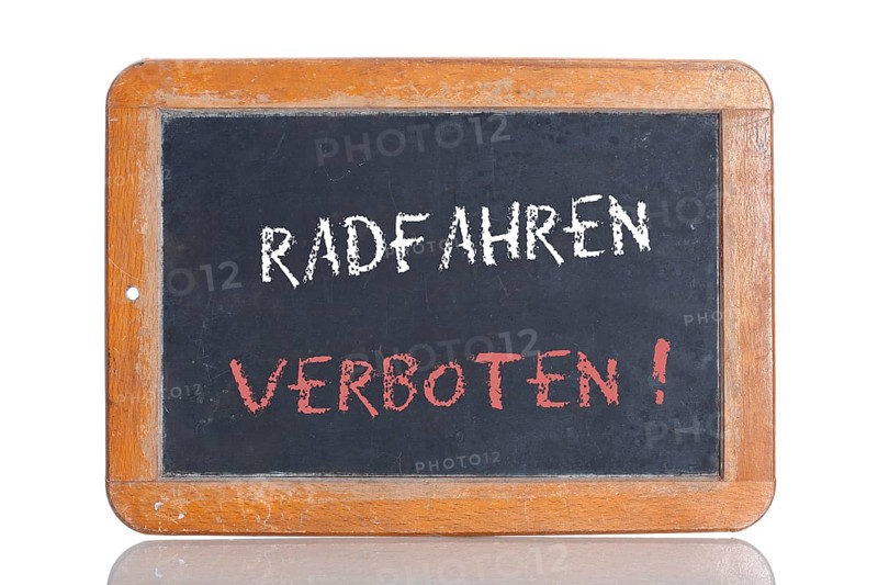 Old school blackboard with the words RADFAHREN VERBOTEN!