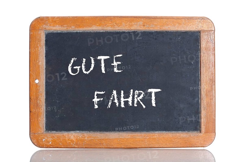 Old school blackboard with the words GUTE FAHRT