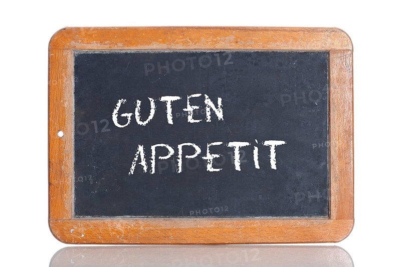 Old school blackboard with the words GUTEN APPETIT