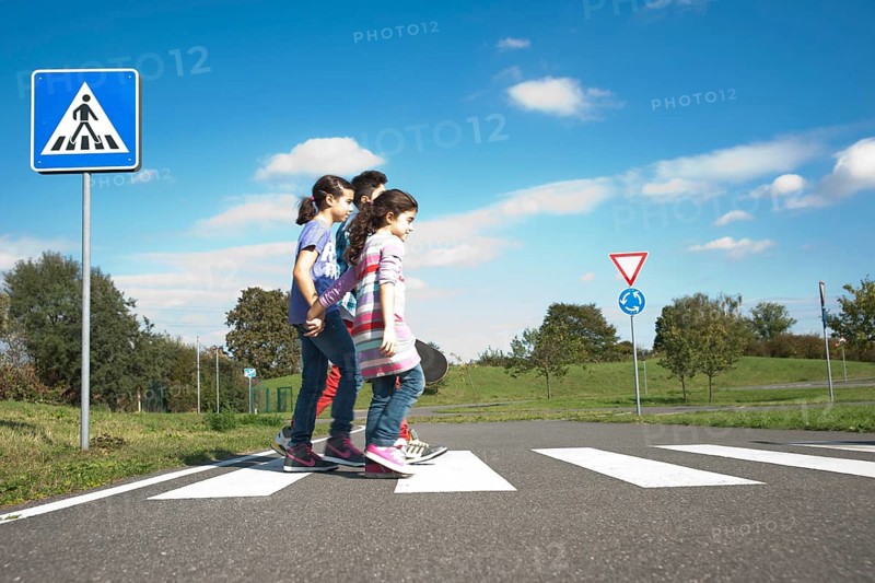 Children crossing a zebra crossing