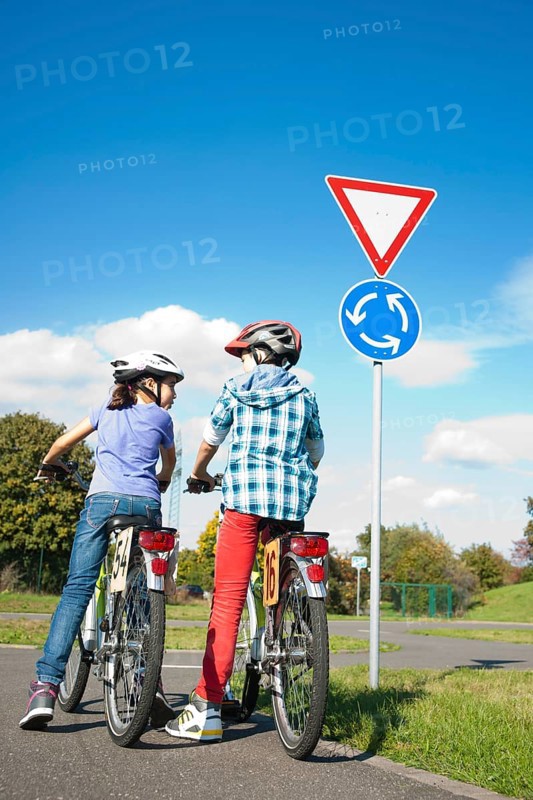 Children on bicycles at a traffic awareness course